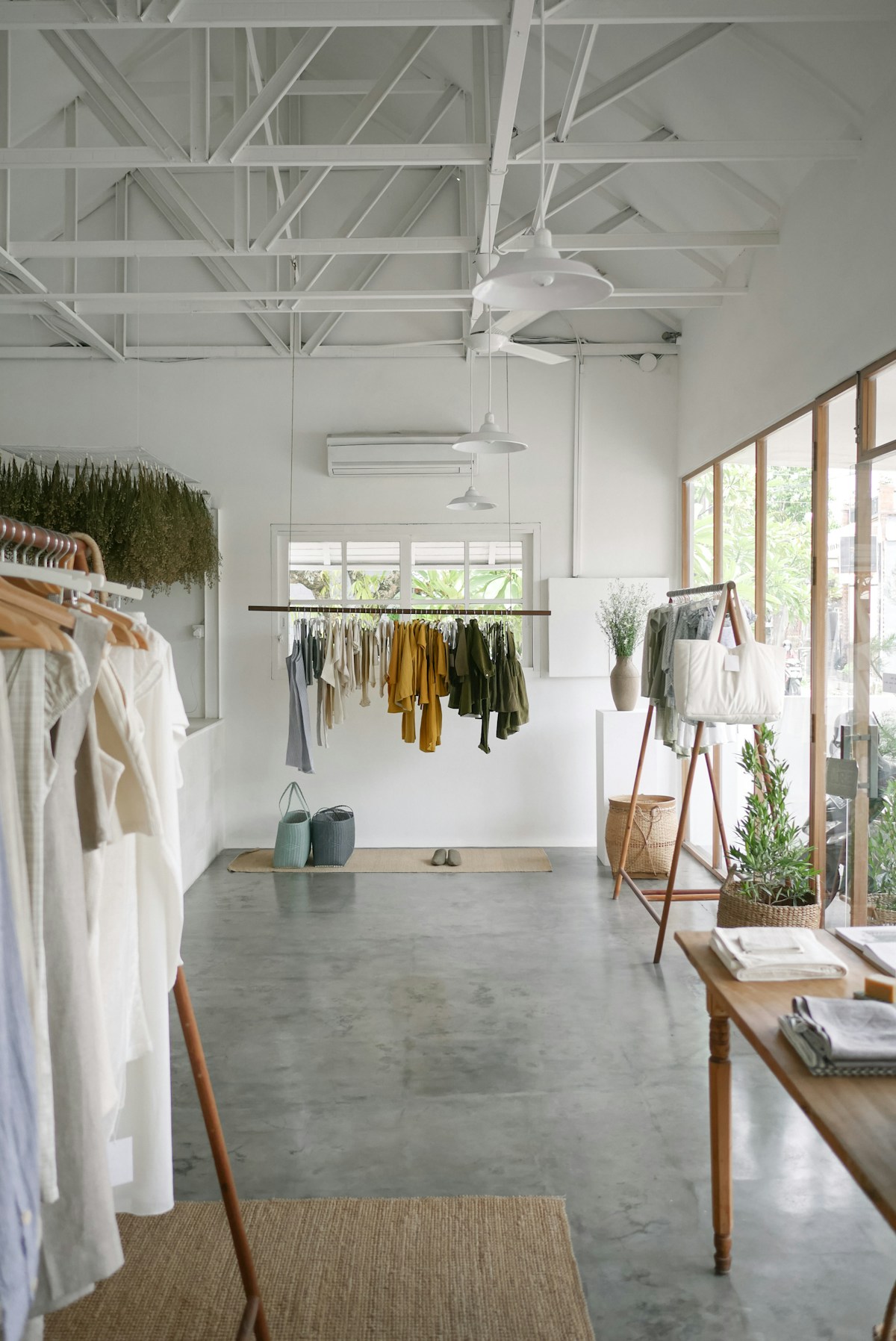 Sunlit boutique with neatly arranged clothing